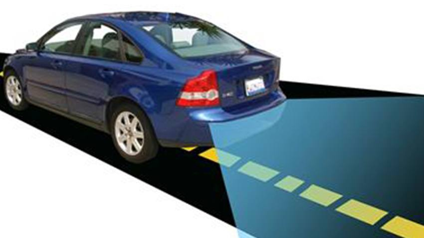 Car equipped with parking sensors and a backup camera system