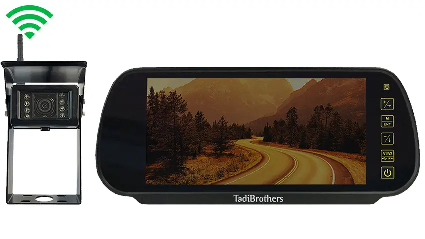 Digital wireless RV backup mirror monitor mounted inside a motorhome displaying rear camera footage for safer reversing, lane changes, and towing visibility on the road