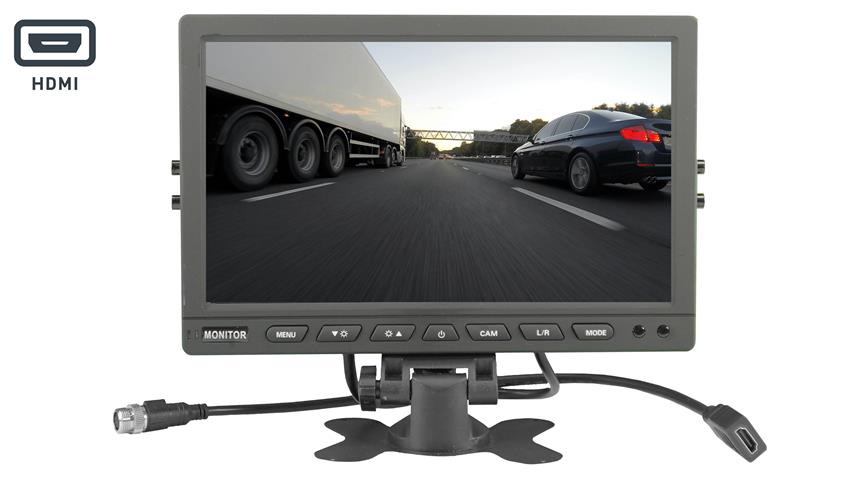 Monitor displaying blind spots around a mobile crane using a 360-degree camera system.